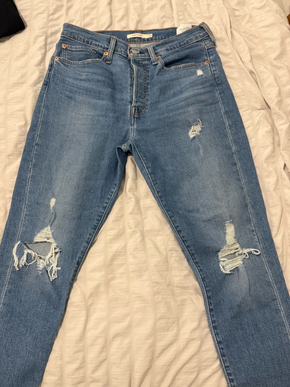Levi's Medium Blue Distressed Skinny Jeans